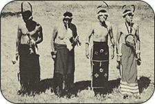 Four plains indians in traditional dress